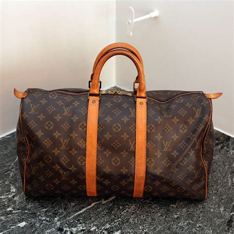 louis vuitton keepall 45 leather|louis vuitton empreinte keepall.